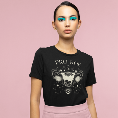 black shirt with celestial and floral uterus that says pro roe