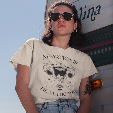 abortion is healthcare shirt with celestial uterus design