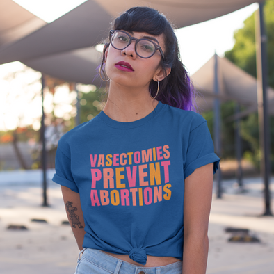 blue shirt says vasectomies prevent abortion in pink and orange letters