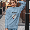 woman wearing a blue virgo astrology sweatshirt